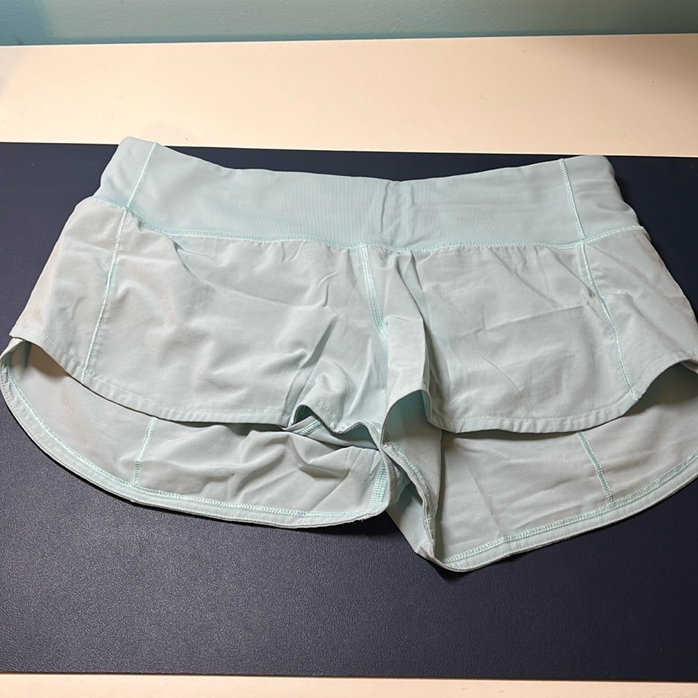 Light teal Lululemon speed up shorts 2” in very good used condition